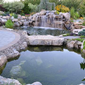 The first of two ponds, this smaller pond with stepping stone bridge was added.