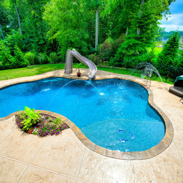 Precision Pool with slide, diving board, tanning ledge & basketball goal