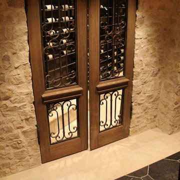 Wine Cellar with aged limestone elements and bluestone floors