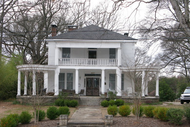 Mid-sized traditional white two-story wood exterior home idea in Atlanta with a hip roof