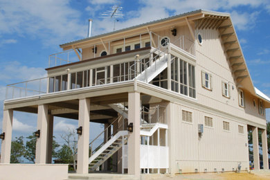 Inspiration for a large modern concrete l-shaped staircase remodel in San Diego with concrete risers