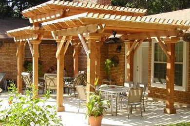 Example of an arts and crafts patio design in Other