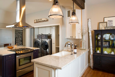 Mid-sized country galley ceramic tile eat-in kitchen photo in Houston with a farmhouse sink, shaker cabinets, granite countertops, stainless steel appliances, an island, mosaic tile backsplash, light wood cabinets and white backsplash