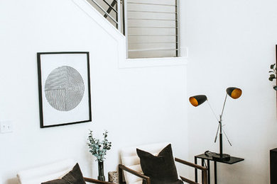 Inspiration for a modern carpeted and gray floor living room remodel in Salt Lake City with white walls