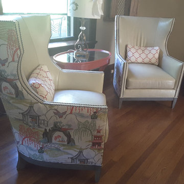 Hancock and Moore chairs with a mix of leather and coordinating fabrics draw the
