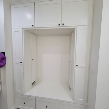 Custom Floor-to-Ceiling White Built-In Cabinetry & Vanity Nook