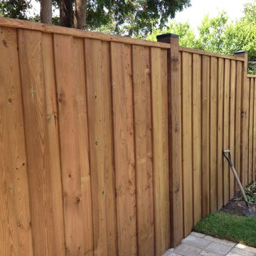 Backyard Interlock Paver Patio with setp down, New Wooden Fence with custom gate