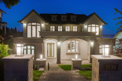 Example of a transitional exterior home design in Vancouver