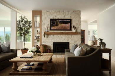 Example of a french country living room design in Denver