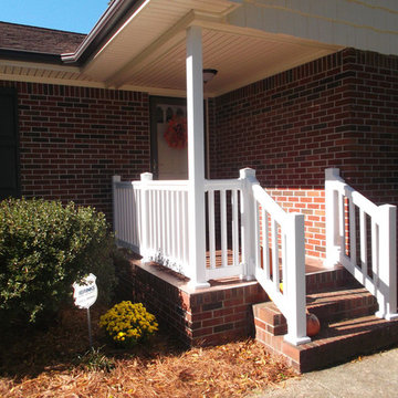 After: Updated Siding, Soffit and Porch Railing