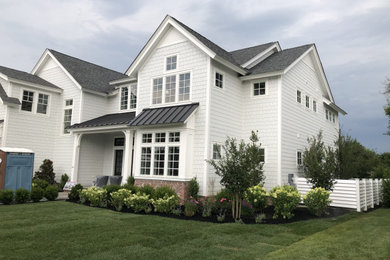 Example of a beach style home design design in Philadelphia