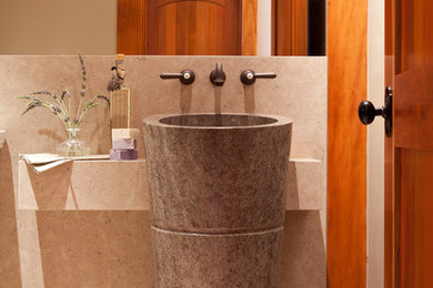 Example of a trendy beige tile powder room design in San Francisco with a pedestal sink