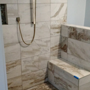 Master Bathroom Remodel with Marble Tile, Pebble Floor & Barn Door — Alameda, CA