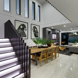 Internal living space with multiple bays of Breezway Louvres for fresh ventilati - Windows