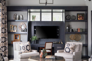 Trendy built-in desk study room photo in Dallas with gray walls