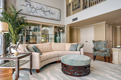 Example of a mid-sized classic formal and open concept medium tone wood floor living room design in Nashville with beige walls