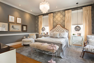 This is an example of a mid-sized traditional master bedroom in Philadelphia with grey walls, medium hardwood floors and no fireplace.