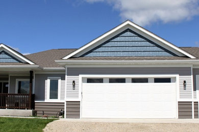 Example of an arts and crafts exterior home design in Minneapolis