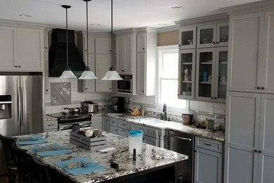 Design ideas for an arts and crafts kitchen in Raleigh.