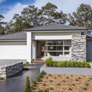 Traditional Exteriors Featuring Stone