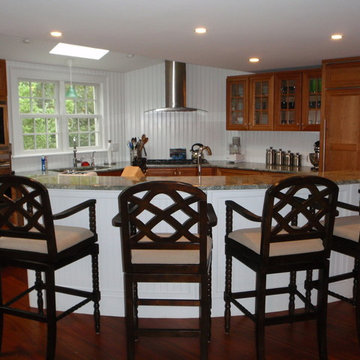 cherry cabinets with rounded half circle island