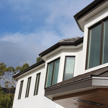 6 inch Angle Face/Flat Face Gutters with smooth Downspouts in Pacific Palisades