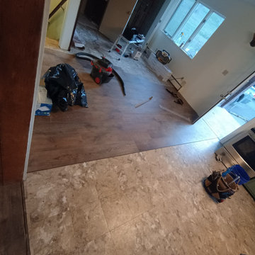 Replace 3 bathrooms and Redo 3 rooms of flooring