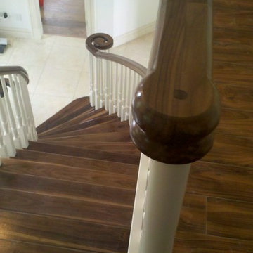Curved Wallnut and painted continuous handrail