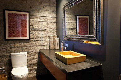 Trendy bathroom photo in Denver with flat-panel cabinets