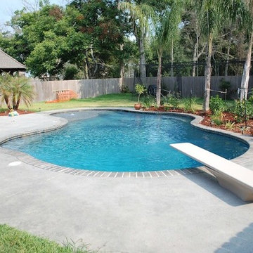 Gunite lagoon pool with diving board