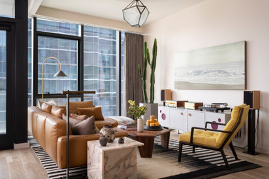 Trendy light wood floor living room photo in Austin