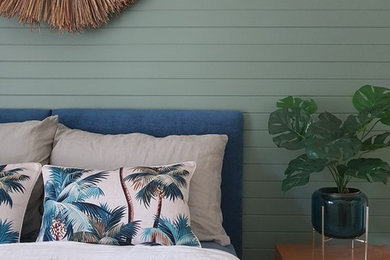 This is an example of a tropical bedroom in Newcastle - Maitland.