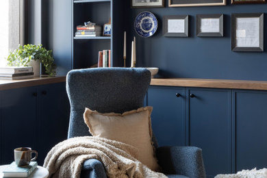 Transitional family room photo in Calgary