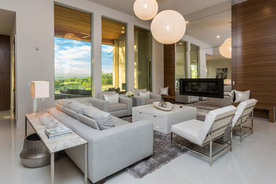Large minimalist open concept porcelain tile family room photo in Other