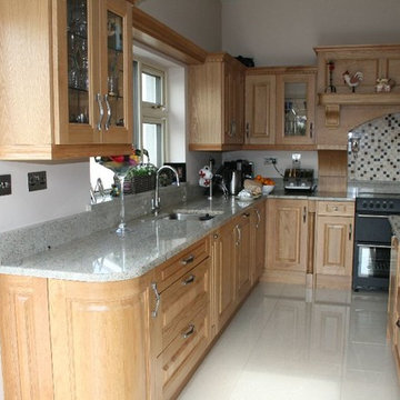 Raw oak raised panel kitchen