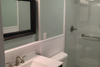 Inspiration for a small craftsman white tile bathroom remodel in Atlanta with shaker cabinets