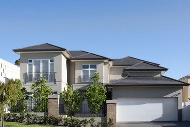 This is an example of a contemporary two-storey beige exterior in Perth.