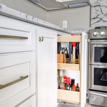 Navy Stained Island, Hood vent and Floating Shelves in White Shaker Kitchen