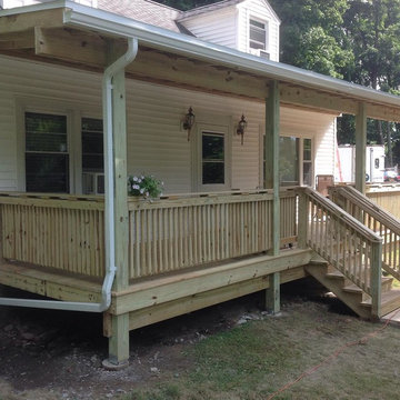 Covered Porch Deck with Custom Locking Sliding Gate
