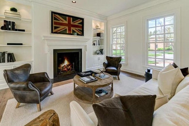 Living room - large farmhouse formal and open concept light wood floor and brown floor living room idea in Columbus with white walls, a standard fireplace, a stone fireplace and no tv
