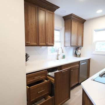 Rich & Refined: Custom Walnut Kitchen Remodel with White Quartz & Oak Flooring