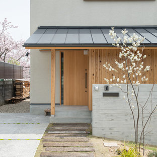 大阪のアジアンスタイルのおしゃれな白い家の写真