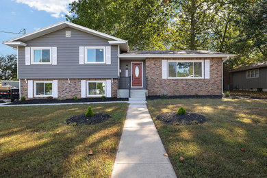 Example of an arts and crafts exterior home design in Other