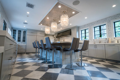 Large 1950s u-shaped marble floor and white floor eat-in kitchen photo in Los Angeles with an undermount sink, shaker cabinets, gray cabinets, quartz countertops, white backsplash, marble backsplash, black appliances and an island