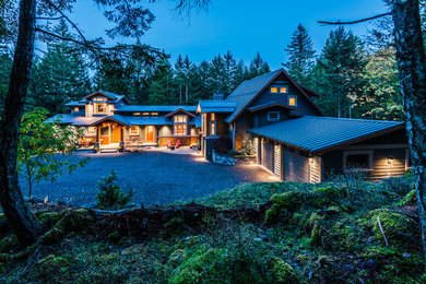 Mountain style home design photo in Vancouver