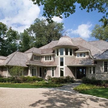 Cape Cod Stone and Shingle Style House with Turret, Jewel Windows and Hip Roof