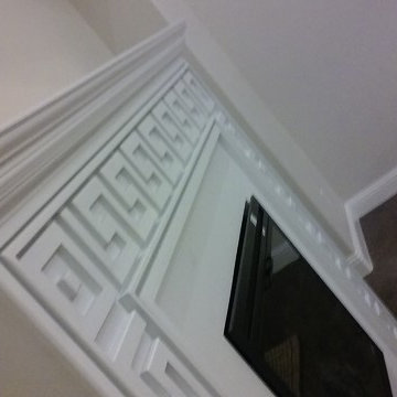 Fireplace mantle w/ Greek key design