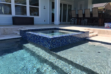 Inspiration for a contemporary pool remodel in Jacksonville