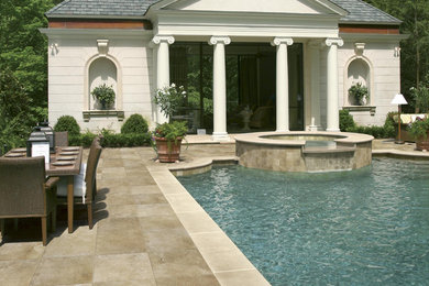 Large mediterranean backyard rectangular lap pool in Austin with a pool house and tile.