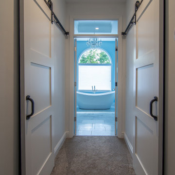 Traditional Master Bath Utilizing Frosted and Clear Glass